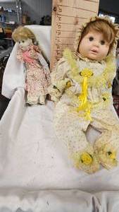 lot 32 image: 1985 Robin Woods Porcelain Doll and additional porcelain doll, no mark