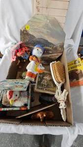 lot 42 image: Celluloid Toy, Hairbrush, music boxes, Pop up Chicken in Box Toy