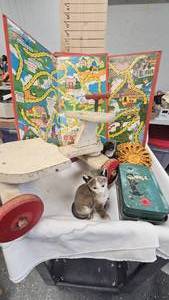 lot 139 image: Childs Wood Ride o, Cat Figures, Uncle Wigglys Game Board, Tin Box