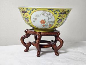 lot 37 image: Daoguang Yellow Ground Famille Rose Bowl