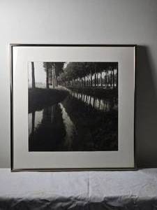 lot 87 image: Shadowy Belgian Fine Art Photography Print - Lynn Geesamen - Canal, Brugge to Damme