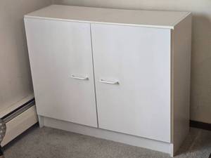 lot 124 image: Minimalist White Accent Cabinet