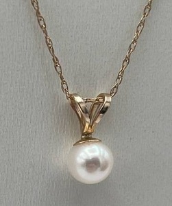 lot 6 image: Vintage 10K Gold & Pearl Pendant Necklace (Both stamped 10K), 16-inch Chain, 1mm thick, and .6 Grams Total Weight