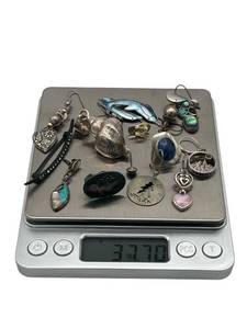 lot 12 image: Wonderful Assortment of Sterling Silver Pieces (37 Grams Total Weight)