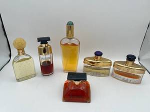 lot 28 image: Vintage Perfume & Cologne Lot - Victorias Secret, Spellbound, Perry Ellis, and Avon Odyssey