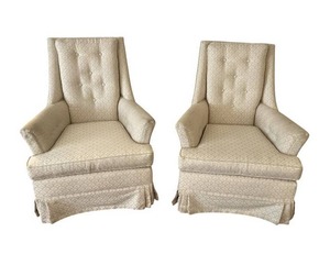 lot 62 image: Pair of Vintage High Back Tufted Ivory Cushioned Swivel Rocking Chairs
