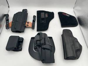 lot 263 image: Blackhawk CQC FN Five-Seven C1219 Holster, Blade-Tech, Uncle Mikes Sidekick Size 2, Comp-Tac, and More
