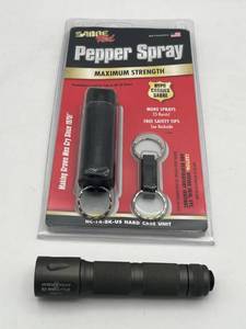 lot 288 image: Surefire E2 Executive (A22206) 4.5-inch Flashlight (Needs batteries) & New Sabre Red Pepper Spray