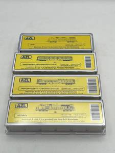 lot 311 image: New AZL Z-Scale GP38 Locomotive, Window Coach, Pullman Sleeper, and SD70ACe