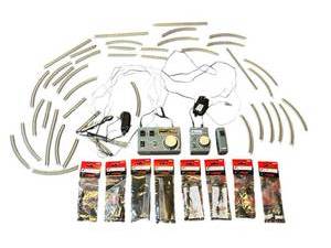 lot 315 image: Vintage ROKUHAN Z-Scale RC-02 & RC-03 Train Controllers, Train Tracks, and New Accessories