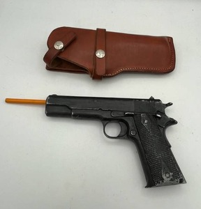 lot 321 image: Vintage Cast Aluminum Colt .45 1911 Toy Replica with Vintage Bucheimer Leather Holster