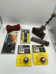 lot 325 image: RAM-LINE X Press Loader, RAM-LINE 9mm Ammo Pick-up Tool, Sand Bag Rest, Versa Ambidextrous Holster, HKS Model 36-A Speed Loaders