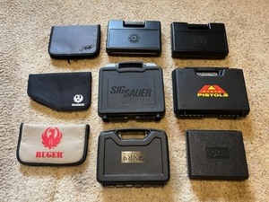 lot 473 image: Assorted Pistol Gun Carrying Cases - SIG SAUER, XR9, Ruger, Steyr, Taurus