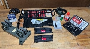 lot 498 image: Gun Cleaning Kit #4 and More - Gun Grip Shooting Vise, Laserlyte Kryptonyte Green Laser Bore Sighter, HK, Caldwell, and More