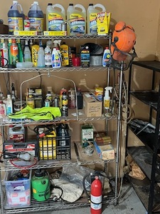 lot 605 image: Garage Shelving Unit #3 Loaded with 4-Ton Hydraulic Hand Jack, Husqvarna Pro Forest Helmet System, and More - Shelving Unit Included