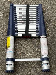 lot 616 image: Nice Xtend & Climb Pro Series 785P Telescoping Ladder ($300 Retail)