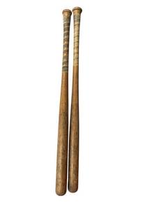 lot 670 image: Two Vintage Louisville Slugger Baseball Bats