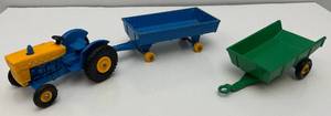 lot 87 image: Misc. 1960s Original Matchbox Lesney N0. 39 Ford Tractor No. 40 Hay Trailer & More (Missing Tires)