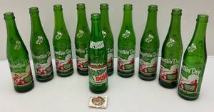 lot 108 image: Vintage Early Mountain Dew Soda Bottles & Cap