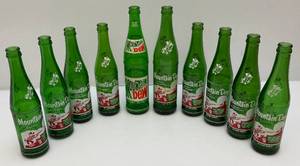 lot 109 image: Vintage Early Mountain Dew Soda Bottles