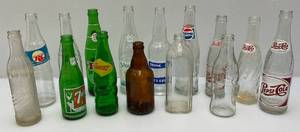 lot 111 image: Misc. Vintage Early Soda Bottle Like Squirt, Pepsi & More