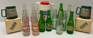 lot 112 image: Misc. Vintage Early Soda Bottles Including Hires, 7UP & More