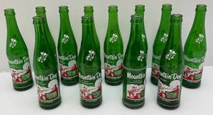 lot 115 image: Vintage Early Mountain Dew Soda Bottles