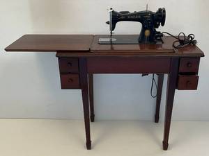 lot 172 image: 1948 SINGER Sewing Machine In Cabinet Made In The Elizabethport, New Jersey USA Factory (With Extras)