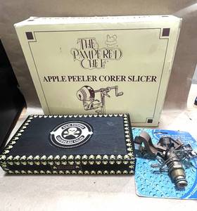 lot 72 image: Pampered Chef Apple Peeler, Sprinkler and Rum Runner Cigar Box
