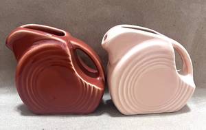 lot 97 image: Pair of Fiesta 5oz Mini Disk Pitchers