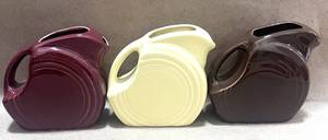 lot 99 image: Three Fiesta 5oz Mini Disk Pitchers