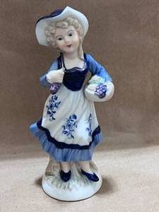 lot 103 image: Pair of Porcelain Figurines Boy and Girl with Grapes