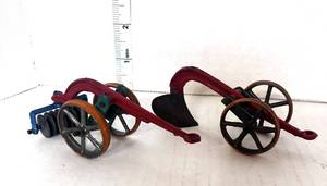 lot 47 image: 2 Vintage Kansas Toy & Novelty Co. Plows