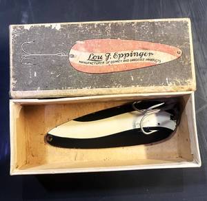 lot 125 image: Antique Lou J. Eppinger Fishing Lure Osprey and Dardevle Products In Box