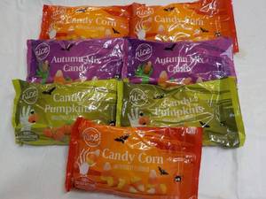 lot 84 image: 7 ct 12 oz Bags Candy in date...