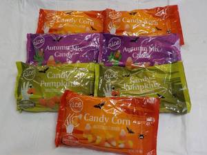 lot 85 image: 7 ct 12 oz Bags Candy in date...