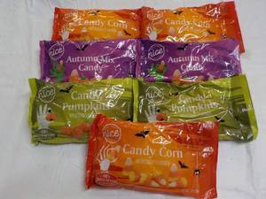 lot 86 image: 7 ct 12 oz Bags Candy in date...