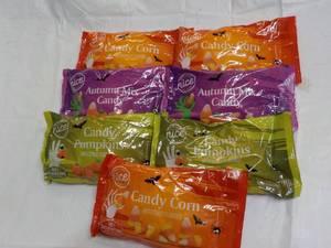 lot 87 image: 7 ct 12 oz Bags Candy in date...