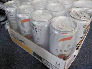lot 169 image: 12 pack Celsius Non Carbonated Peac...