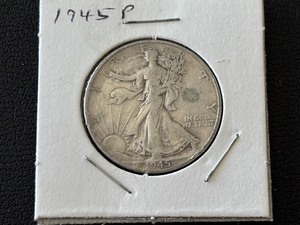 lot 101 image: 1945 Walking Liberty Half Dollar