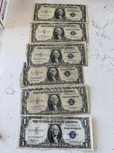 lot 127 image: 1935 Blue Seal $1 Dollar Silver Certificates