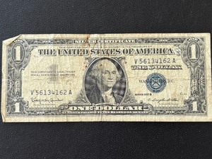 lot 132 image: 1957 B Blue Seal $1 Dollar Silver Certificate