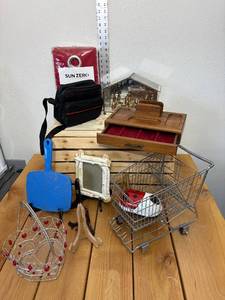 lot 26-D2025 image: Misc Lot, Mini Shopping Cart, Curtain, Glass Nativity Set w Copper and Brass Nativity Scene, Night Stand Organizer