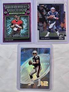 lot 28 image: Lot of 3 Tom Brady Cards