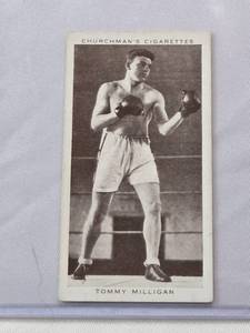 lot 121 image: Tommy Milligan 1938 Boxing Personalities W.A. & A.C. Churchman #29 Vintage Boxing Card