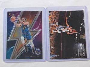lot 136 image: Lot of 2 Stephen Curry Cards 2023-24 Panini Select Thunder Lane #10 & Stephen Curry 2013-14 Panini Hoops Courtside #12