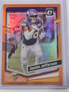 lot 261 image: Justin Jefferson 2023 Panini Optic Orange Prizm #125 and Numbered 83249