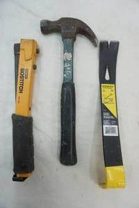 lot 26 image: hand tools hammer, hammer stapler, and nail puller
