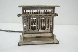 lot 64 image: Antique Toaster