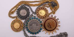lot 57 image: US Coin w Jewelry Attachment Lot